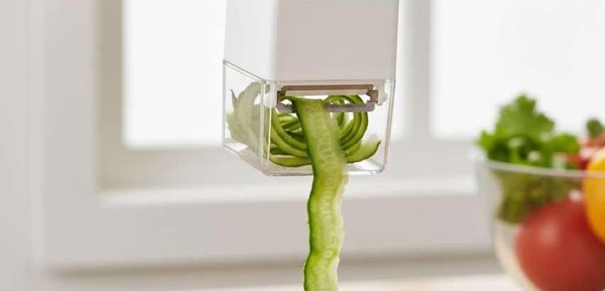 قشارة خضروات مع صندوق للقشور